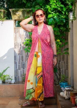 Model in Printed Halter Flare Dress posing front