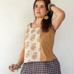 Model in Brown Two Tone Patched Blouse posing while looking up