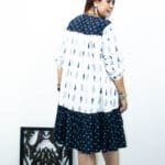 Model in Blue Bow-tie Printed Dress posing back