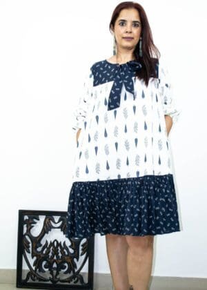 Model in Blue Bow-tie Printed Dress posing front