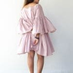 Model in Onion A-line Frilled Dress - back
