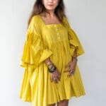 Model in Yellow A-line Frilled Dress