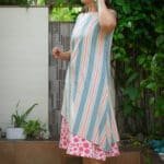 Model in multi-colored Mix Printed Layered Dress posing front