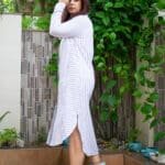 Model in Blue Panelled Long Shirt Dress posing side