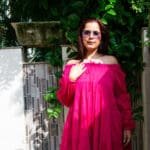 Model in Fuchsia Crinkled Tiered Dress posing front