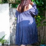 Model in Blue Crinkled Tiered Dress posing back
