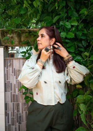 Model in Mint Embroidered Beetles Top posing front
