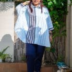 Model in Blue Boxy Pleated Top posing front