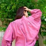 Model in Burgundy Embroidered Beetles Top posing back