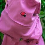 Model in Burgundy Embroidered Beetles Top