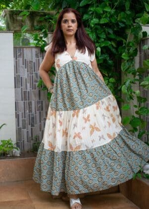 Model in Green Shoulder Bow Tiered Maxi Dress posing front