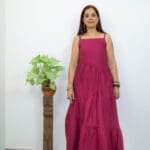 Model in Burgundy Low-back tiered Dress posing front