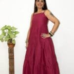 Model in Burgundy Low-back tiered Dress posing side