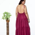 Model in Burgundy Low-back tiered Dress posing back