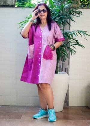 Model in Pink Two Toned Pocket Dress posing front