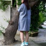 Model in Blue Two Toned Pocket Dress posing back