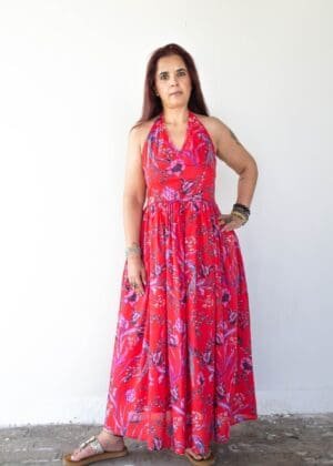 Model in Red Printed Backless Halter Dress posing front